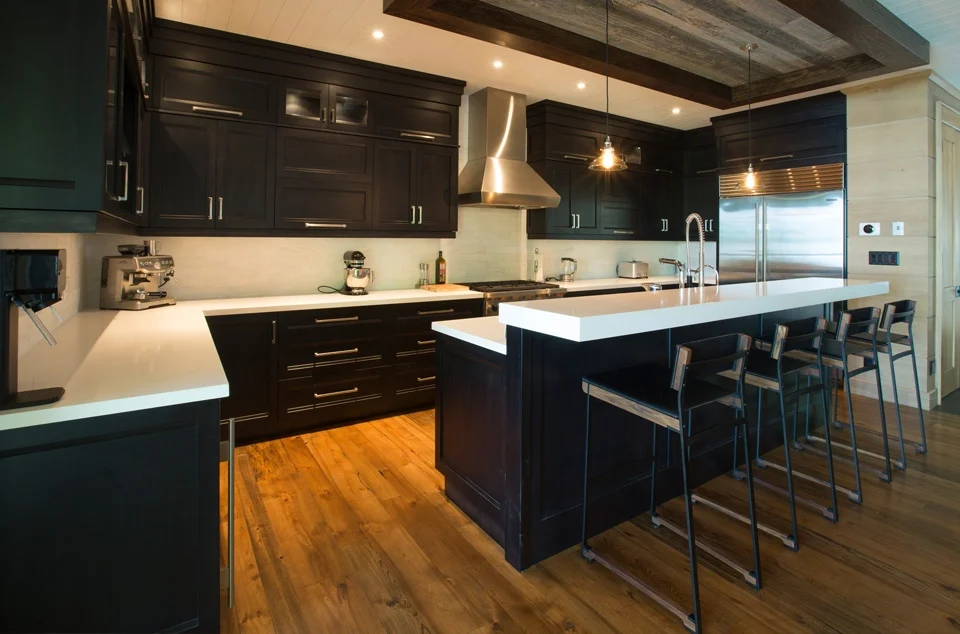 kitchen with black cabinets white counter tops