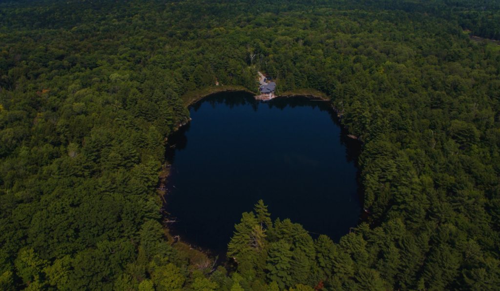 aterfront property on an Ontario lake with a boathouse, stone stairs, and a dock